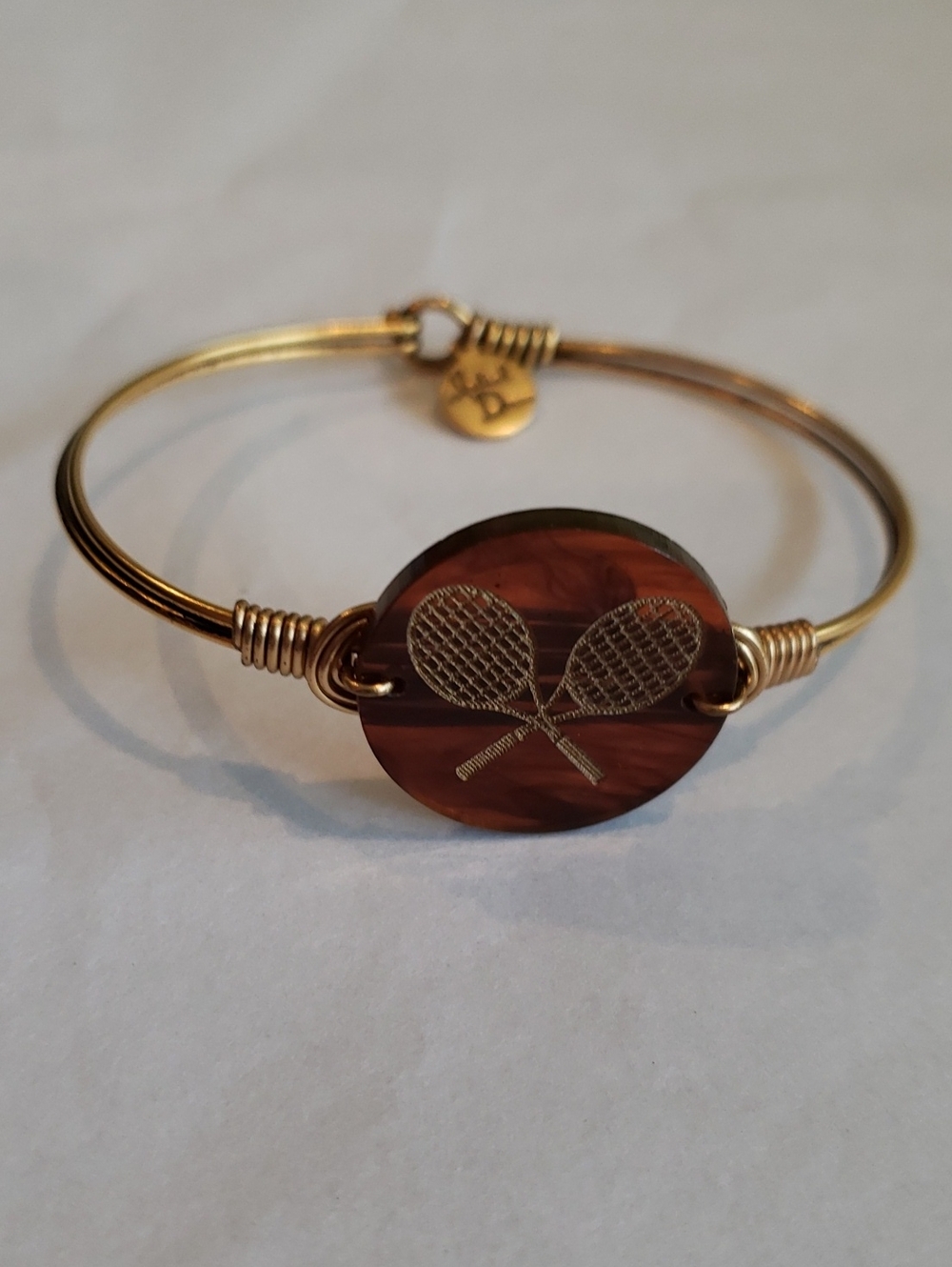 Gold-Tone Bracelet with Brown Tennis Racket Disc